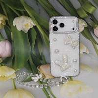 Coque de téléphone antichoc avec nœud 3D en strass et dragonne en perles pour iPhone X 11 12 13 15 16 17 Samsung S26