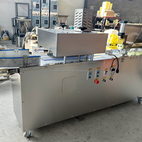 Coupe-pâte automatique et rouleau à boules pour boulangerie, production de boules d'avoine