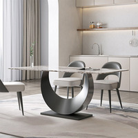 Table à manger Runwood au design moderne avec base en acier inoxydable et plateau en pierre frittée pour usage domestique