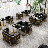 Luxuriöses PU-Tisch-und-Stuhl-Set für Westliche Restaurants, Cafés, Teeläden, Ruhebereiche, Hochwertige Hotellobby, Besprechungsbereiche und Sofas