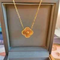 Vente en gros, pendentif polyvalent en or 18 carats à cinq feuilles, trèfle à quatre feuilles, collier en acier inoxydable pour femmes, pendentifs et breloques à la mode