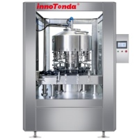 Machine de remplissage rotative automatique pour bouteilles en verre de jus de fruits