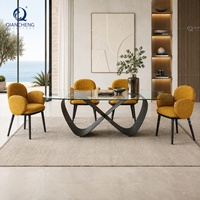 Table à manger moderne en verre trempé de 12 mm avec base en acier carbone Infinity, mobilier de luxe pour villa, fabricant en gros