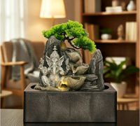 Fontaine de table Ganesha en argent avec cascade de lotus, lumière LED et bassin carré pour la décoration zen de la maison ou du bureau