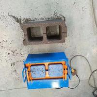 Nouvelle machine manuelle à pression QT pour la fabrication de briques de ciment avec moteur, pour blocs de pavage creux en mousse autobloquants