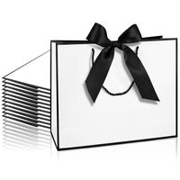 Sac en papier à bordure noire haut de gamme Emballage personnalisé Ligne d'emballage de cadeaux Sacs à provisions en papier de conception avec arcs