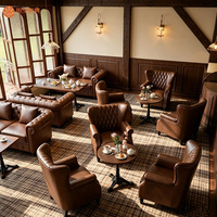 Fauteuil lounge commercial en cuir, style vintage, fauteuil club rembourré en PU pour restaurant, café, bar, hall d'hôtel, salon de thé