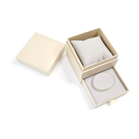 Feuille d'or personnalisée de haute qualité et estampage boîte à bijoux en papier rigide boîtes d'emballage en velours avec oreiller cadeau en carton pour montre