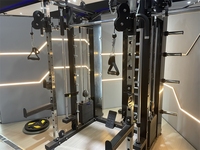 Utilisation commerciale câble croisé puissance Squat Rack Smith Machine équipement d'entraînement de gymnastique multifonctionnel en acier