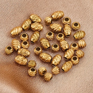 Cuentas Facetadas en Forma de Barril |   Cuentas espaciadoras talladas de acero inoxidable chapadas en oro PVD de 18K para la fabricación de pulseras y collares DIY - Product Image 2