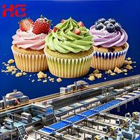 Ligne de production de gâteaux automatiques entièrement automatisée pour gâteaux en papier, gâteaux fourrés et gâteaux de forme personnalisée, machine à fabriquer des gâteaux