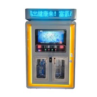 Distributeur automatique de produits 24h/24 : eau et lessive, idéal pour les laveries et les salles de jeux