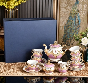Complete White Embossed Floral Bone China Tea Set Teapot Cups Sugar Creamer Classic Style Eco-Friendly Gift Box for Hotel - Product Image 1
