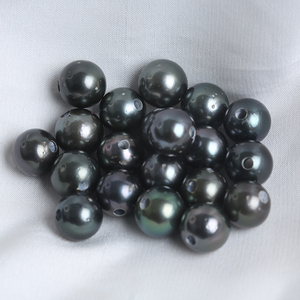 Venta al por mayor de perlas de Tahití sueltas redondas negras de pavo real de agua de mar natural de 11-12mm con agujeros de 2,5mm - Product Image 2