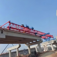 Lanceur de poutres de pont monté sur rail, capacité de 900 tonnes, chariot électrique, moteur/boîte de vitesses/roulement/moteur pour l'installation de poutres lourdes