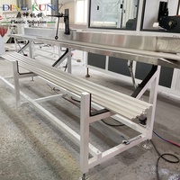 Machine de fabrication de panneaux muraux en bois naturel, panneaux en PVC insonorisés, extrudeuse, ligne de production de panneaux de décoration intérieure en provenance de Chine