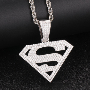 gold superman pendant 
