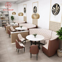 Meubles de salle à manger de café de luxe canapé demi-rond en cuir avec design matelassé ensemble de table et de chaises rondes en marbre commercial