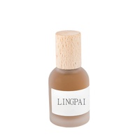 Vente en gros 30ml50ml100ml Flacon de parfum rond en verre transparent dépoli avec bouchon en bois