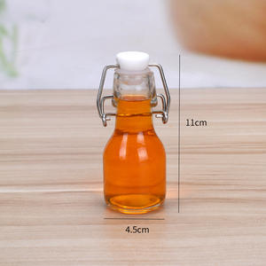 Mini botellas de vidrio <span class=keywords><strong>licor</strong></span> bebida aceite de cocina 60ml 120ml botellas de vidrio con tapa superior oscilante - Product Image 6
