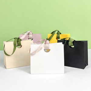 Hot Selling Greaseproof Brown Kraft Wedding Candy Packaging Handbag Die-Cut Handles Ribbon Luxurious Eco-Friendly Craft Bag - Product Image 2