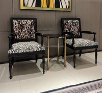 Chaise d'appoint en tissu à motif léopard de réception antique de luxe tissu imprimé léopard en bois noir Fauteuil de villa Chaise de salle à manger