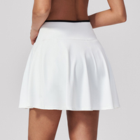 Shorts de sport grande taille en gros, anti-reflet, jupe de tennis couleur chair, pantalon de yoga plissé pour le fitness