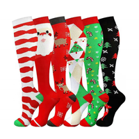 Vente en gros de chaussettes de compression personnalisées anti-fatigue et soulagement de la douleur pour le cyclisme, le football et les sports