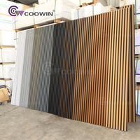 Revêtement mural Wpc extérieur extérieur Panneau mural composite Panneau mural en bois PVC Panneau de revêtement extérieur cannelé co-extrudé