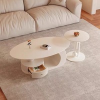 Ensemble de tables basses modernes haut de gamme, durables, avec rangement, compactes, légèrement luxueuses, de style français, en dalle de pierre ovale, couleur crème, pour salon