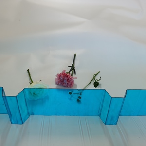 Feuille ondulée en <span class=keywords><strong>polycarbonate</strong></span> <span class=keywords><strong>de</strong></span> conception moderne Matériau <span class=keywords><strong>de</strong></span> toiture <span class=keywords><strong>traité</strong></span> aux <span class=keywords><strong>UV</strong></span> Feuille <span class=keywords><strong>de</strong></span> PC pour une utilisation en extérieur - Product Image 1