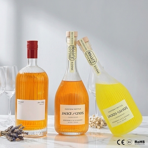 Elegante Botella de Vidrio Acanalado de 500ml, Botella de Licores de Cuello Largo Acanalado, Botella de Vino en Forma de Lágrima para Limoncello y Brandy, Venta al por Mayor Personalizada - Product Image 1