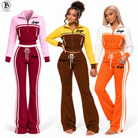 Nouvel Arrivage 2026 Ensemble Femme Color Block en Maille Gaufrée : Veste Zippée et Pantalon Évasé – Tenue de Sport 2 Pièces pour le Streetwear
