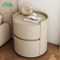 Chevet rond en cuir de luxe Wayon, table de chevet moderne à 2 tiroirs avec détails cousus pour chambres à coucher haut de gamme