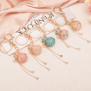 スパークリングクリスタルキーホルダーラブリークリスタルマネーバッグ女性かわいいアクセサリーバッグチャーム車の高級キーチェーンキーリングおもちゃギフト - Product Image 1
