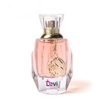 Flacon de parfum ovale en verre de 50 ml avec pompe pulvérisatrice, estampage à chaud, emballage carton, vide, rechargeable, orange rose, OEM/ODM, vente en gros Devi