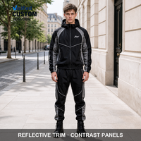 Ensemble de survêtement noir personnalisé pour homme avec pantalon de jogging à capuche zippé, blocs de couleur et passepoil blanc, taille élastique côtelée pour activités sportives et extérieures