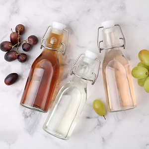 Bouteilles en verre transparent à bouchon basculant pour le lait, la bière et les spiritueux - Bouteilles en verre durables et écologiques, taille personnalisée - Product Image 2