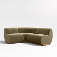FERLY Maßgefertigtes, direkt ab Werk erhältliches, modulares, geschwungenes Sofa, modernes, skulpturales Stoff-Ecksofa mit Holzsockel für luxuriöse Villenprojekte