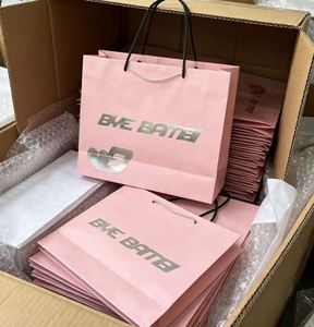 ถุงกระดาษสำหรับร้านขายเสื้อผ้าและรองเท้าแบบกำหนดเอง บรรจุภัณฑ์ของขวัญ ถุงช้อปปิ้ง พิมพ์บรรจุภัณฑ์กระดาษ - Product Image 1