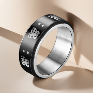 Roterende ring van roestvrij staal, zwarte band met zilverachtige vlindergravure voor angstverlichting en dagelijks modegebruik - Product Image 5