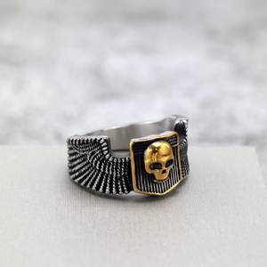 Stainless Steel <b>Ring</b> With Golden Skull Wings Design For Men And Women Halloween Fashion Jewelry Hip Hop Style - Product Image 1