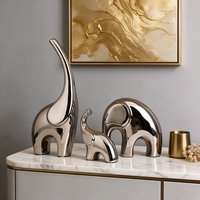 Ensemble de figurines d'éléphants en céramique argentée moderne, finition miroir, sculpture animale abstraite, décoration de luxe pour la maison, cadeau d'anniversaire