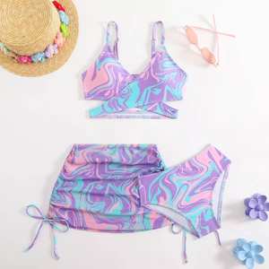 Ensemble <span class=keywords><strong>de</strong></span> <span class=keywords><strong>maillot</strong></span> <span class=keywords><strong>de</strong></span> <span class=keywords><strong>bain</strong></span> <span class=keywords><strong>de</strong></span> plage 3 pièces pour enfants - Haut <span class=keywords><strong>de</strong></span> bikini imprimé marbré/tie-dye, bas et jupe portefeuille élégante - Product Image 5