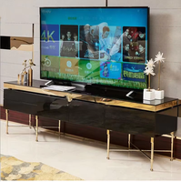 Meuble tv de luxe italien, support tv moderne et brillant, avec pieds en métal doré, pour salon