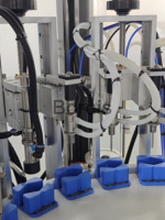 Machine automatique de sertissage et de collogation de capuchons de parfum à commande PLC