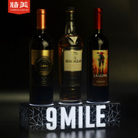 Usine du Vietnam Présentoir à vin léger en acrylique Casiers à vin de bar Siège d'affichage à LED pour vin rouge Présentoir pour discothèque KTV