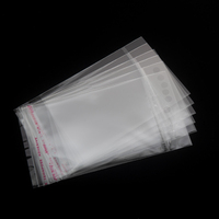 Conception de sac à tête de carte blanche impression en taille-douce nouveau matériau sacs Opp recyclables de qualité alimentaire pour l'emballage de sacs en plastique d'emballage cadeau