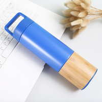Bouteille isotherme de voyage en acier inoxydable 550 ml avec poignée en bambou, personnalisable, anti-fuite, sans BPA, avec couvercle