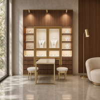 Vitrine à bijoux en marbre blanc sculpté doré, vitrine européenne en aluminium avec verre incurvé et éclairage LED, taille personnalisée pour boutique de détail